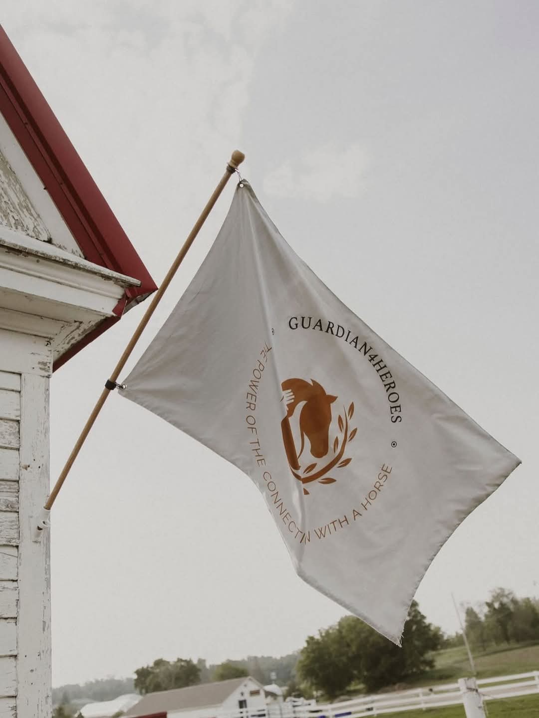 Guardian 4 Heroes flag waving gently.